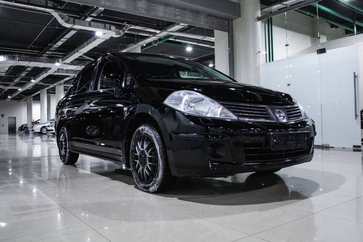 Купить Tiida с пробегом